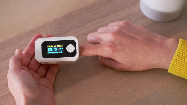 Reading A Human O2 Sensor 91 Pulse Oximeter Reading Stock Videos, Footage, & 4K Video Clips ...