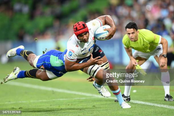 Langi Gleeson of the NSW Waratahs is tackled during the round two Super Rugby Pacific match between Fijian Drua and NSW Waratahs at AAMI Park, on...