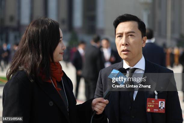 Actor Donnie Yen Ji-dan, attend the opening of the first session of the 14th Chinese People's Political Consultative Conference at The Great Hall of...