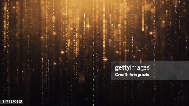 shining golden glittery background - ceremonia de entrega de premios fotografías e imágenes de stock