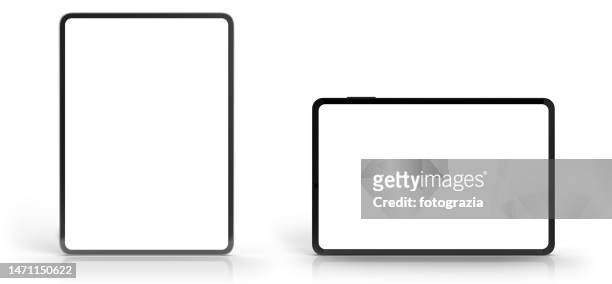 front view of digital tablets with clipping path for the screens - horizontal web banner stock pictures, royalty-free photos & images