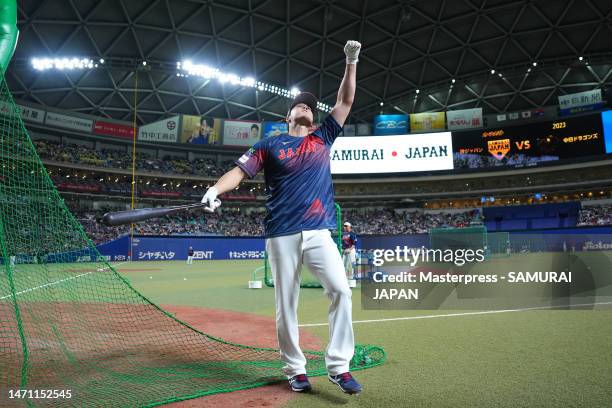 Pitcher Shohei Ohtani of Samurai Japan reacts after the batting practice prior to the practice game between Samura Japan and Chunichi Dragons at...