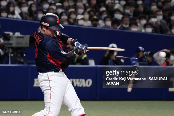 Infielder Shugo Maki of Samurai Japan breaks the bat in the first inning during the practice game between Samura Japan and Chunichi Dragons at...