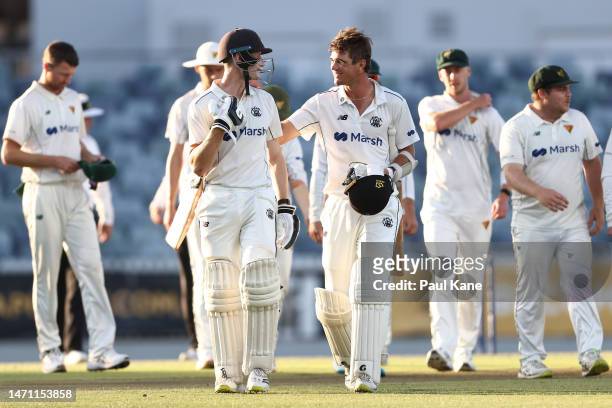 Cameron Bancroft and Teague Wyllie of Western Australia walk from the field after winningdthe Sheffield Shield match between Western Australia and...