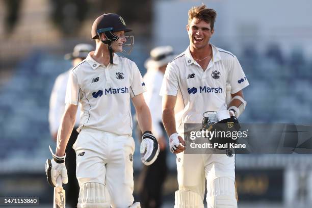 Cameron Bancroft and Teague Wyllie of Western Australia walk from the field after winning the Sheffield Shield match between Western Australia and...
