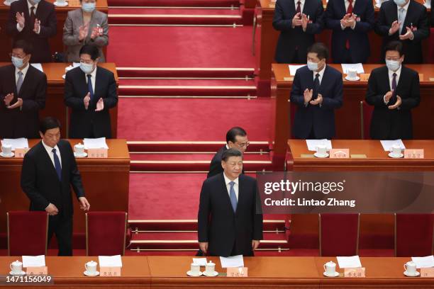 Li Zhanshu of National People's Congress ,Chinese President Xi Jinping and Chinese Premier Li Keqiang attend the opening of the first session of the...