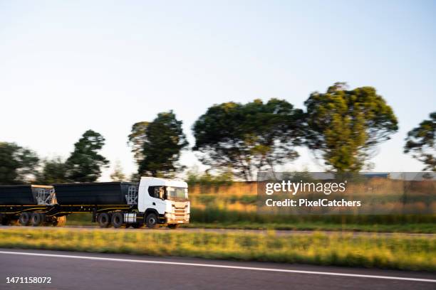 close up early morning sunshine on truck and rural landscape - sunny morning stock pictures, royalty-free photos & images