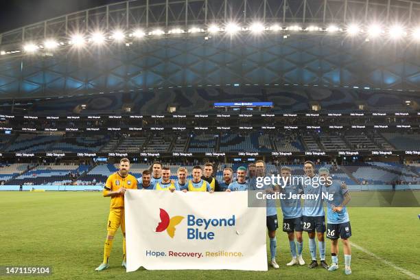 Captain of Sydney FC Alex Wilkinson attends a presentation after winning the round 19 A-League Men's match between Sydney FC and Melbourne Victory at...