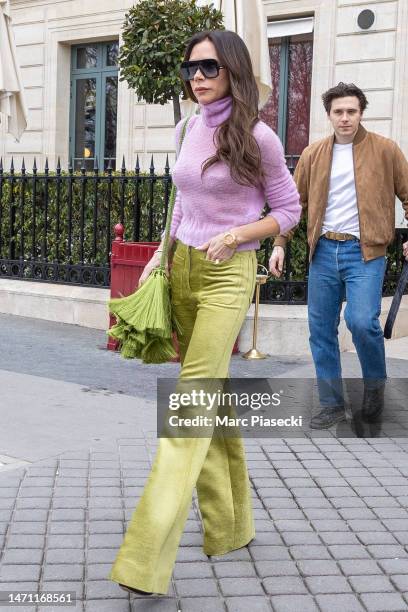 Victoria Beckham and Brooklyn Beckham are seen on March 04, 2023 in Paris, France.