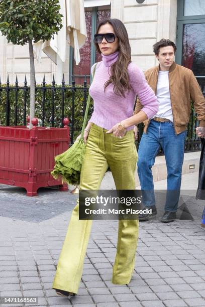 Victoria Beckham and Brooklyn Beckham are seen on March 04, 2023 in Paris, France.