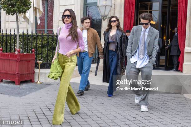 Victoria Beckham, Brooklyn Beckham, Nicola Peltz and Cruz Beckham are seen on March 04, 2023 in Paris, France.