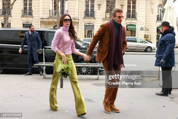 Victoria Beckham and David Beckham are seen arriving at a restaurant on March 04, 2023 in Paris, France.