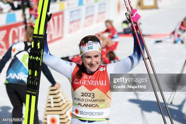 Gold medalist Ebba Andersson of Sweden celebrates victory after the Cross-Country Women's 30km Mass Start Classic at the FIS Nordic World Ski...