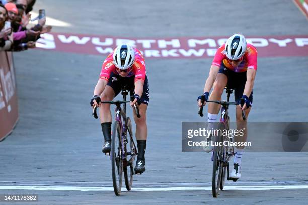 Lotte Kopecky of Belgium and Demi Vollering of The Netherlands and Team SD Worx sprint at finish line to win during the Eroica - 9th Strade Bianche...