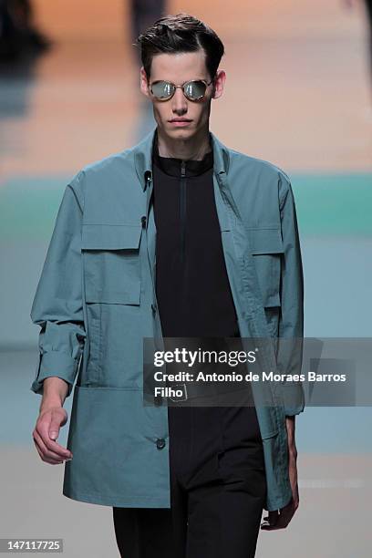 Model walks the runway during the Z Zegna show as a part of Milan Fashion Week Menswear Spring/Summer 2013, on June 25, 2012 in Milan, Italy.