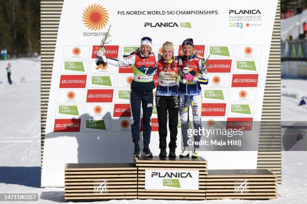 Silver medalist Anne Kjersti Kalvaa of Norway, gold medalist Ebba Andersson of Sweden and bronze medalist Frida Karlsson of Sweden pose for a photo...