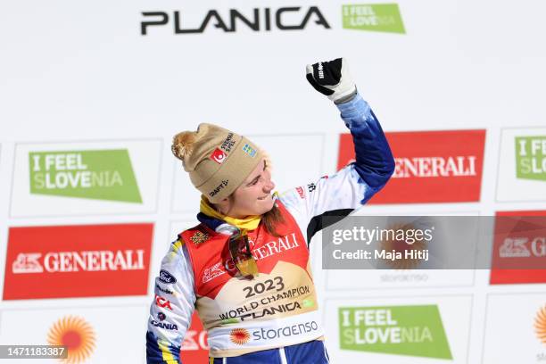 Gold medalist Ebba Andersson of Sweden celebrates during the victory ceremony for Cross-Country Women's 30km Mass Start Classic at the FIS Nordic...