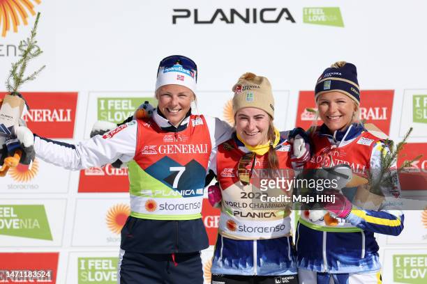 Silver medalist Anne Kjersti Kalvaa of Norway, gold medalist Ebba Andersson of Sweden and bronze medalist Frida Karlsson of Sweden pose for a photo...