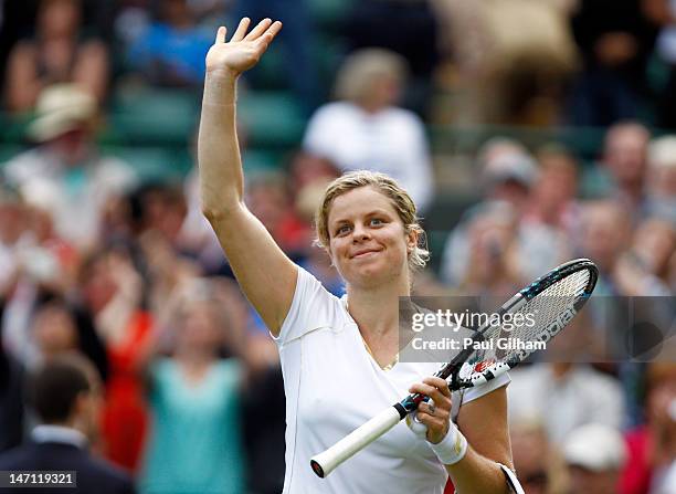 Kim Clijsters of Belgium celebrates match point during her ladies' singles first round match against Jelena Jankovic of Serbia on day one of the...