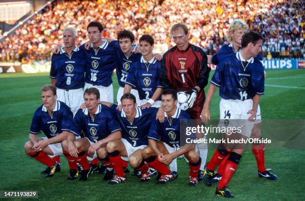 June 1998, Saint-Etienne - FIFA World Cup - Scotland v Morocco - Scotland pose for a team group photo: top row, from l to r: Craig Burley, David...