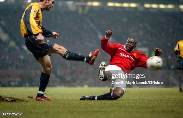 January 2000, Manchester - Premiership Football - Manchester United v Arsenal - Dwight Yorke of Man Utd is too late to intercept Martin Keown of...