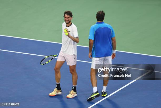 Maxime Cressy of USA and Fabrice Martin of France celebrate victory against Lloyd Glasspool of Great Britain and Harri Heliovaara of Finland during...