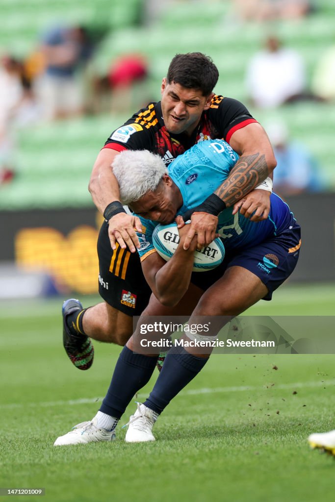 Fine Inisi of Moana Pasifika is tackled during 2023 Super Rugby Super