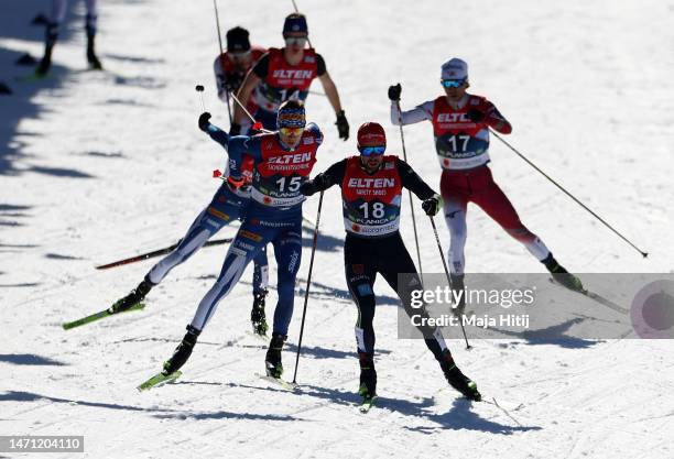 Eero Hirvonen of Finland, Johannes Rydzek of Germany and Akito Watabe of Japan compete during the cross country leg of Nordic Combined Men's...