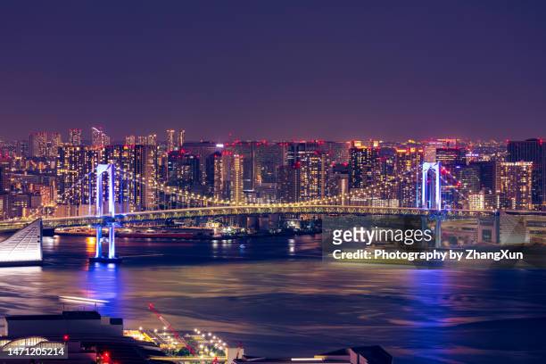 tokyo city aerial view night skyline of toyosu, japan. - toyosu stock-fotos und bilder