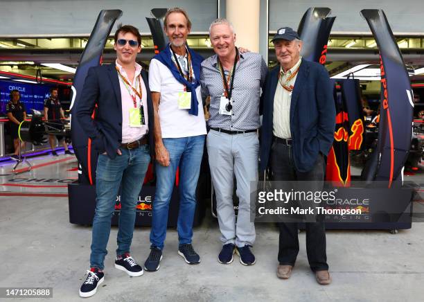 James Blunt, Mike Rutherford, Rory Bremner and Nick Mason pose for a photo outside the Red Bull Racing garage during qualifying ahead of the F1 Grand...