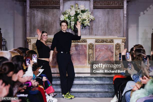 Designers Ester Manas and Balthazar Delepierre acknowledge the audience during the Ester Manas Womenswear Fall Winter 2023-2024 show at the American...
