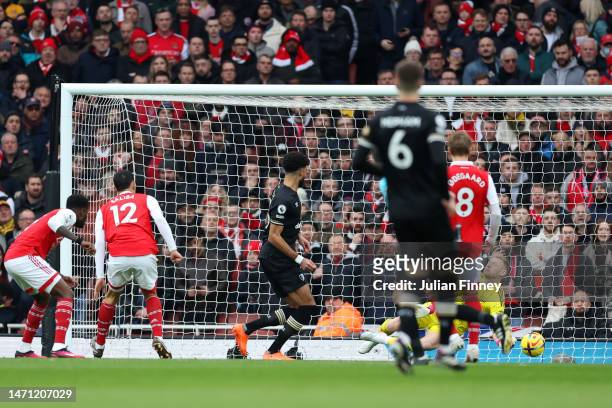 Philip Billing of AFC Bournemouth scores the team's first goal during the Premier League match between Arsenal FC and AFC Bournemouth at Emirates...