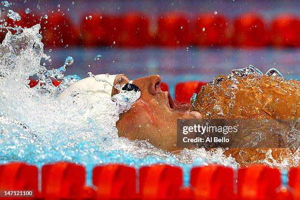Ryan Lochte competes in preliminary heat 12 of the Men's 400 m Individual Medley during the 2012 U.S. Olympic Swimming Team Trials at CenturyLink...
