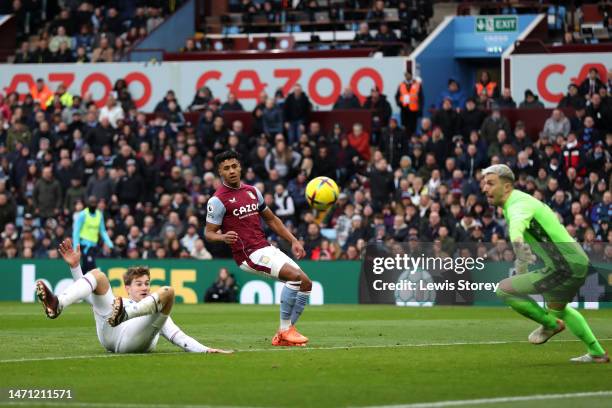 Joachim Andersen of Crystal Palace scores an own goal for Aston Villa's first goal as Ollie Watkins of Aston Villa watches on during the Premier...