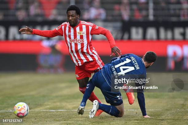 Sheraldo Becker of 1.FC Union Berlin is challenged by Jonas Hector of 1.FC Koeln during the Bundesliga match between 1. FC Union Berlin and 1. FC...