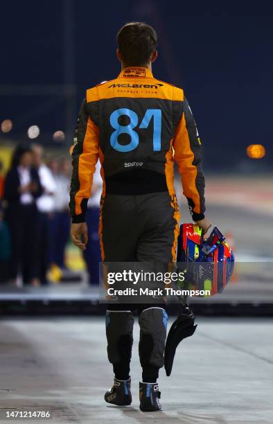 18th placed qualifier Oscar Piastri of Australia and McLaren walks in the Pitlane during qualifying ahead of the F1 Grand Prix of Bahrain at Bahrain...