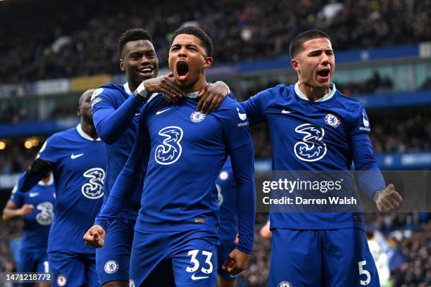 Wesley Fofana of Chelsea celebrates with teammates Benoit Badiashile and Enzo Fernandez after scoring the team's first goal during the Premier League...