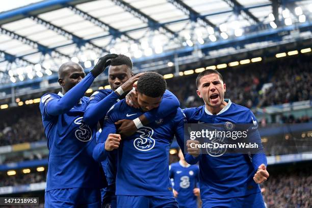 Wesley Fofana of Chelsea celebrates with teammates after scoring the team's first goal during the Premier League match between Chelsea FC and Leeds...