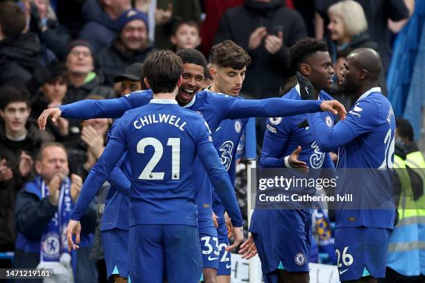 Wesley Fofana of Chelsea celebrates with teammates after scoring the team's first goal during the Premier League match between Chelsea FC and Leeds...