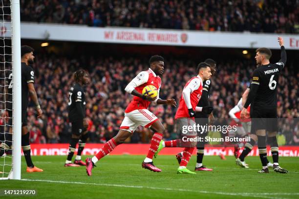 Thomas Partey of Arsenal celebrates after scoring the team's first goal during the Premier League match between Arsenal FC and AFC Bournemouth at...