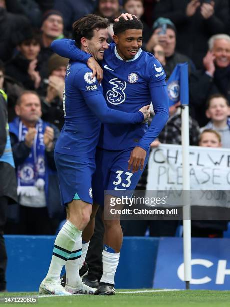 Wesley Fofana of Chelsea celebrates with teammate Ben Chilwell after scoring the team's first goal during the Premier League match between Chelsea FC...