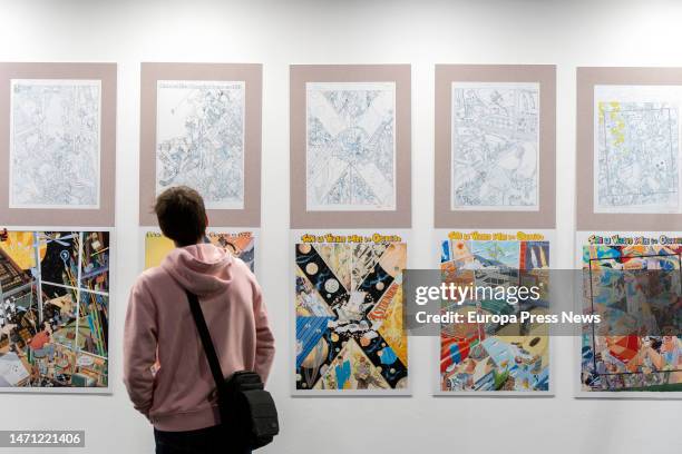 Person contemplates an exhibition at the celebration of the third edition of the Salon del Comic de Valencia, on March 4 in Valencia, Valencian...