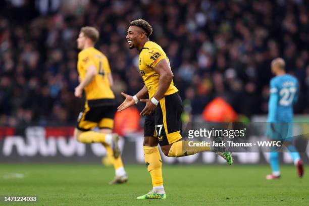 Adama Traore of Wolverhampton Wanderers celebrates after scoring the team's first goal during the Premier League match between Wolverhampton...