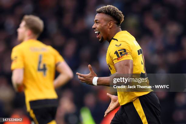 Adama Traore of Wolverhampton Wanderers celebrates after scoring the team's first goal during the Premier League match between Wolverhampton...