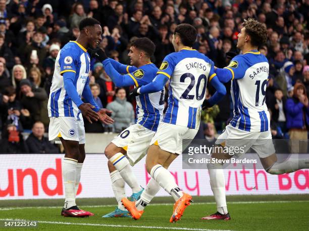 Danny Welbeck of Brighton & Hove Albion celebrates with teammates after scoring the team's fourth goal during the Premier League match between...