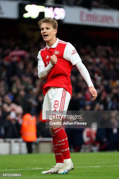 Martin Odegaard of Arsenal celebrates victory following the Premier League match between Arsenal FC and AFC Bournemouth at Emirates Stadium on March...