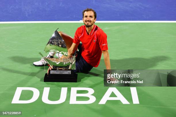 Daniil Medvedev celebrates with his winners trophy after the Men's Final Single's match on day fourteen of the Dubai Duty Free Tennis at Dubai Duty...