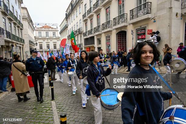 Young drummers open the rally as teachers marchin in protest for better working conditions from Rossio Square to the Portuguese Parliament during a...