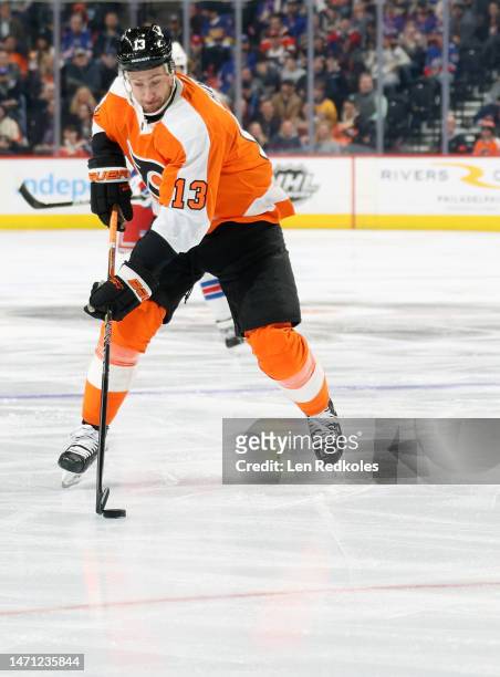 Kevin Hayes of the Philadelphia Flyers skates the puck against the New York Rangers at the Wells Fargo Center on March 1, 2023 in Philadelphia,...