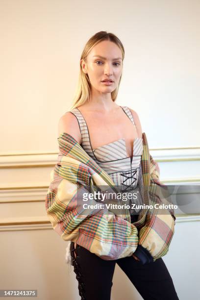 Candice Swanepoel poses backstage prior to the Vivienne Westwood Womenswear Fall Winter 2023-2024 show as part of Paris Fashion Week on March 04,...